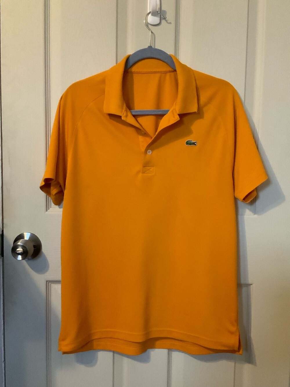 Lacoste Men's Sport Ultra-Dry Jersey Polo Shirt in Orange / Mustard Yellow